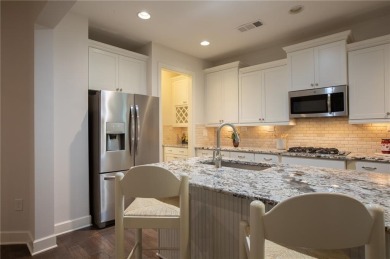 Enjoy the perfect balance of comfort and connection in this on Lanier Island Legacy Golf Couorse in Georgia - for sale on GolfHomes.com, golf home, golf lot
