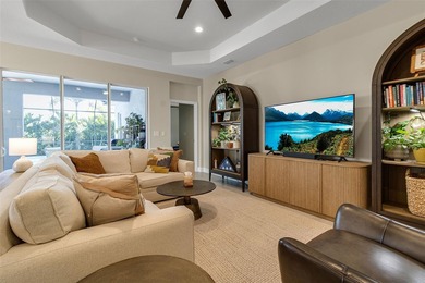 Pool home ~ nestled within the coveted Windward community in the on The Founders Golf Club in Florida - for sale on GolfHomes.com, golf home, golf lot