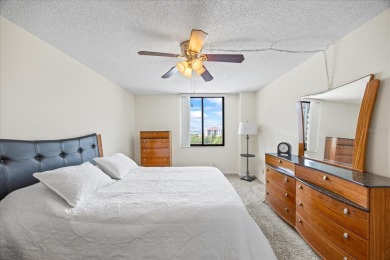 Welcome to your tropical retreat in the highly sought-after Isla on Isla Del Sol Yacht and Country Club in Florida - for sale on GolfHomes.com, golf home, golf lot