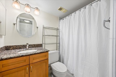 Welcome to your tropical retreat in the highly sought-after Isla on Isla Del Sol Yacht and Country Club in Florida - for sale on GolfHomes.com, golf home, golf lot
