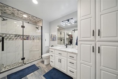 Luxury meets lake life in this completely remodeled 1-bedroom on Shangri La Golf Resort and Club in Oklahoma - for sale on GolfHomes.com, golf home, golf lot