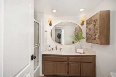 Bright and airy, this beautifully remodeled condominium exudes a on Mission Viejo Country Club in California - for sale on GolfHomes.com, golf home, golf lot