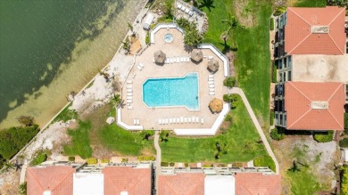 Welcome to your tropical retreat in the highly sought-after Isla on Isla Del Sol Yacht and Country Club in Florida - for sale on GolfHomes.com, golf home, golf lot