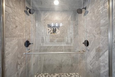 Luxury meets lake life in this completely remodeled 1-bedroom on Shangri La Golf Resort and Club in Oklahoma - for sale on GolfHomes.com, golf home, golf lot