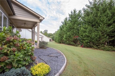 Enjoy the perfect balance of comfort and connection in this on Lanier Island Legacy Golf Couorse in Georgia - for sale on GolfHomes.com, golf home, golf lot