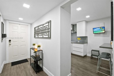 Don't miss your chance to own this beautifully remodeled on Sunrise Lakes Phase IV Golf Course in Florida - for sale on GolfHomes.com, golf home, golf lot