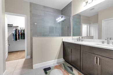 Pool home ~ nestled within the coveted Windward community in the on The Founders Golf Club in Florida - for sale on GolfHomes.com, golf home, golf lot