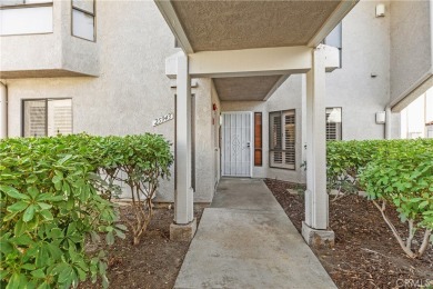 Bright and airy, this beautifully remodeled condominium exudes a on Mission Viejo Country Club in California - for sale on GolfHomes.com, golf home, golf lot