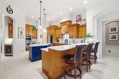 Prepare to experience a residence where timeless craftsmanship on Shadow Wood Preserve in Florida - for sale on GolfHomes.com, golf home, golf lot