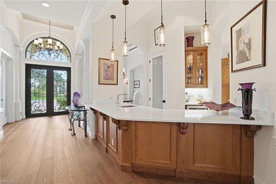 Prepare to experience a residence where timeless craftsmanship on Shadow Wood Preserve in Florida - for sale on GolfHomes.com, golf home, golf lot