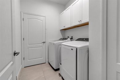 Pool home ~ nestled within the coveted Windward community in the on The Founders Golf Club in Florida - for sale on GolfHomes.com, golf home, golf lot