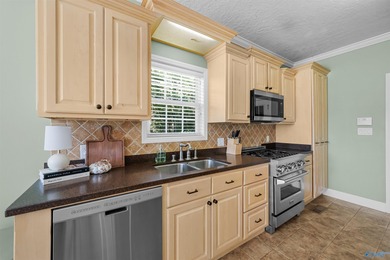 Welcome to this stunning all-brick home perfectly situated on on Briarmeade Golf Course in Alabama - for sale on GolfHomes.com, golf home, golf lot