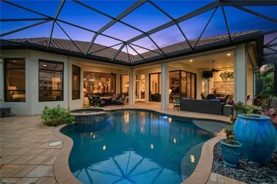 Prepare to experience a residence where timeless craftsmanship on Shadow Wood Preserve in Florida - for sale on GolfHomes.com, golf home, golf lot