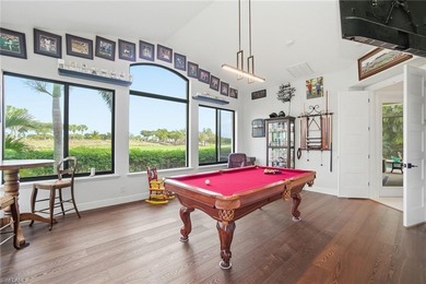 Prepare to experience a residence where timeless craftsmanship on Shadow Wood Preserve in Florida - for sale on GolfHomes.com, golf home, golf lot