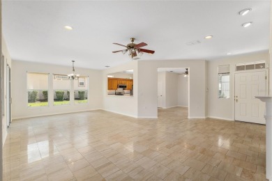 BE SURE TO SEE THE VIDEO TOUR!  OVERLOOKING THE TEE BOX of #1 on Eagle Ridge At Spruce Creek Country Club in Florida - for sale on GolfHomes.com, golf home, golf lot