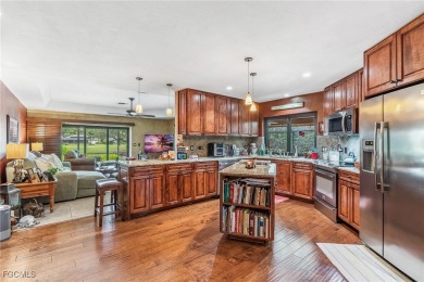Beautifully maintained 4 bedroom 2.5 bathroom pool home on an on Royal Palm Golf Club in Florida - for sale on GolfHomes.com, golf home, golf lot