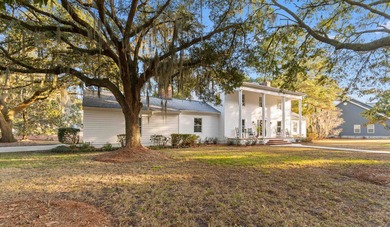 Imagine enjoying your morning coffee on the back patio here at on Wedgefield Plantation Golf Club in South Carolina - for sale on GolfHomes.com, golf home, golf lot