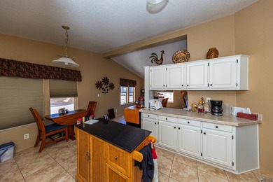 Beautifully furnished 3-bedroom, 2-bath home on a double lot on Foothills Executive Golf Course in Arizona - for sale on GolfHomes.com, golf home, golf lot