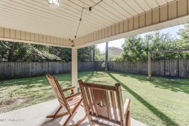 Located in the heart of Diamondhead, this 3-bedroom, 2-bath home on Diamondhead Country Club in Mississippi - for sale on GolfHomes.com, golf home, golf lot