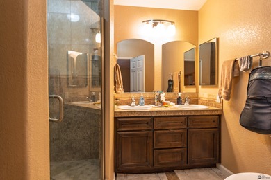 Beautifully furnished 3-bedroom, 2-bath home on a double lot on Foothills Executive Golf Course in Arizona - for sale on GolfHomes.com, golf home, golf lot