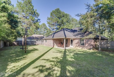 Located in the heart of Diamondhead, this 3-bedroom, 2-bath home on Diamondhead Country Club in Mississippi - for sale on GolfHomes.com, golf home, golf lot