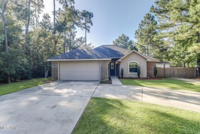 Located in the heart of Diamondhead, this 3-bedroom, 2-bath home on Diamondhead Country Club in Mississippi - for sale on GolfHomes.com, golf home, golf lot