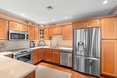 GREAT VALUE! Beautiful golf course & pond views in this lovely on Quail Ridge Golf Course and Country Club in Florida - for sale on GolfHomes.com, golf home, golf lot