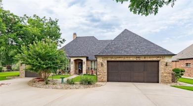 Welcome home to this charming custom residence tucked away on a on Pecan Plantation Country Club in Texas - for sale on GolfHomes.com, golf home, golf lot