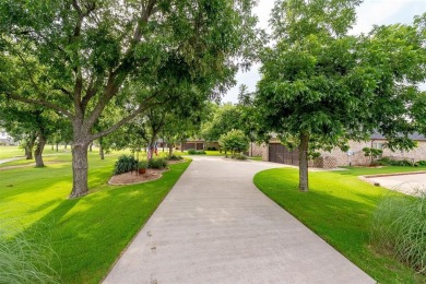 Welcome home to this charming custom residence tucked away on a on Pecan Plantation Country Club in Texas - for sale on GolfHomes.com, golf home, golf lot