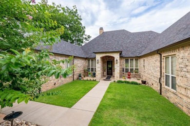 Welcome home to this charming custom residence tucked away on a on Pecan Plantation Country Club in Texas - for sale on GolfHomes.com, golf home, golf lot
