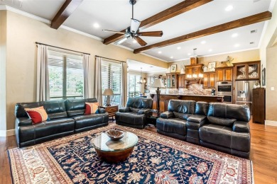 Welcome home to this charming custom residence tucked away on a on Pecan Plantation Country Club in Texas - for sale on GolfHomes.com, golf home, golf lot