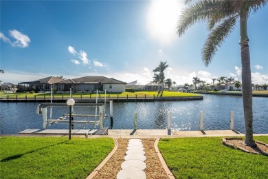 WATERFRONT pool home in Punta Gorda Isles, with intersecting on Saint Andrews South Golf Club in Florida - for sale on GolfHomes.com, golf home, golf lot