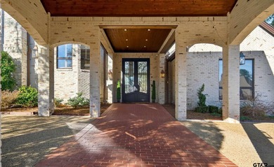 Nestled on a rare, sprawling one-acre, corner lot overlooking on Hollytree Country Club in Texas - for sale on GolfHomes.com, golf home, golf lot