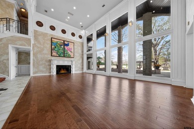 Nestled on a rare, sprawling one-acre, corner lot overlooking on Hollytree Country Club in Texas - for sale on GolfHomes.com, golf home, golf lot