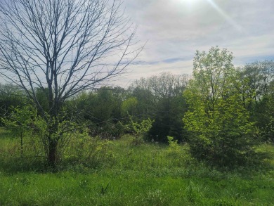 Gently sloping .81 acre homesite near Eagle Ridge's *The on Eagle Ridge Inn and Resort in Illinois - for sale on GolfHomes.com, golf home, golf lot