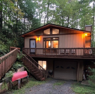 Nestled on 2.3 private wooded acres in the highly sought-after on Connestee Falls Golf Club in North Carolina - for sale on GolfHomes.com, golf home, golf lot