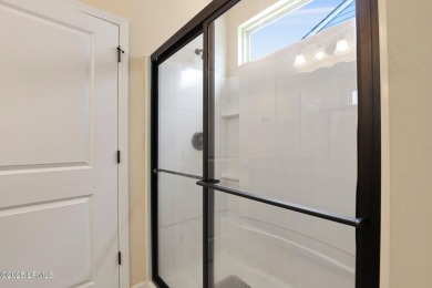 Don't miss this stunning former model home with golf & lagoon on Okatie Creek Golf Club in South Carolina - for sale on GolfHomes.com, golf home, golf lot