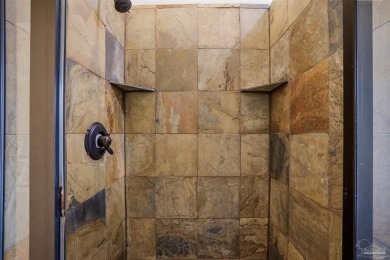Welcome to this stunning custom-built estate in one of Gulf on Tiger Point Golf and Country Club in Florida - for sale on GolfHomes.com, golf home, golf lot
