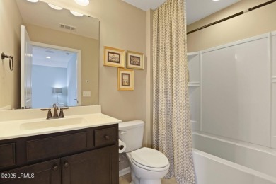 Don't miss this stunning former model home with golf & lagoon on Okatie Creek Golf Club in South Carolina - for sale on GolfHomes.com, golf home, golf lot
