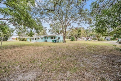 Under contract-accepting backup offers. Step back in time in to on Babe Zaharias Golf Course in Florida - for sale on GolfHomes.com, golf home, golf lot