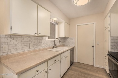 Welcome to 869 Leisure World in Mesa AZ. This 2 bedroom 1.5 bath on Leisure World Country Club in Arizona - for sale on GolfHomes.com, golf home, golf lot