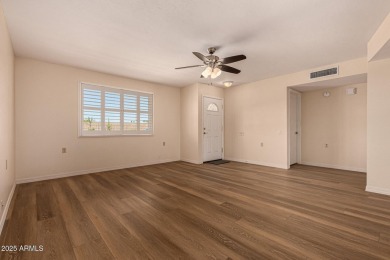 Welcome to 869 Leisure World in Mesa AZ. This 2 bedroom 1.5 bath on Leisure World Country Club in Arizona - for sale on GolfHomes.com, golf home, golf lot