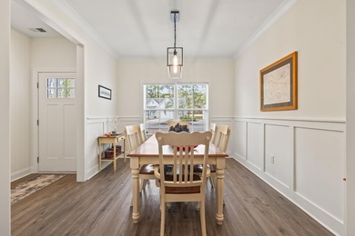 This move-in-ready home features luxury vinyl plank flooring on Shaftesbury Glen Golf and Fish Club in South Carolina - for sale on GolfHomes.com, golf home, golf lot