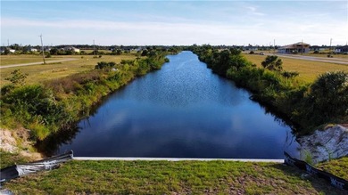 Highly desirable waterfront southern exposure .30 acre level lot on Burnt Store Golf Club in Florida - for sale on GolfHomes.com, golf home, golf lot
