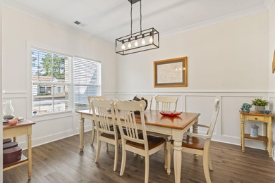 This move-in-ready home features luxury vinyl plank flooring on Shaftesbury Glen Golf and Fish Club in South Carolina - for sale on GolfHomes.com, golf home, golf lot