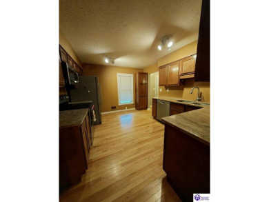 Don't miss this rare opportunity to own a beautiful brick home on Doe Valley Country Club in Kentucky - for sale on GolfHomes.com, golf home, golf lot