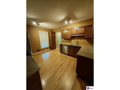 Don't miss this rare opportunity to own a beautiful brick home on Doe Valley Country Club in Kentucky - for sale on GolfHomes.com, golf home, golf lot
