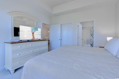 Enjoy easy coastal living in this 2-bedroom, 2-bath condo on Barefoot Resort and Golf Club  in South Carolina - for sale on GolfHomes.com, golf home, golf lot