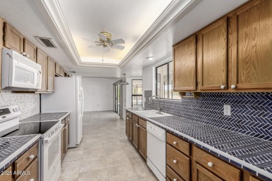 Don't miss out on this charming corner-lot gem in the vibrant on Briarwood Country Club in Arizona - for sale on GolfHomes.com, golf home, golf lot