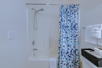 Enjoy easy coastal living in this 2-bedroom, 2-bath condo on Barefoot Resort and Golf Club  in South Carolina - for sale on GolfHomes.com, golf home, golf lot